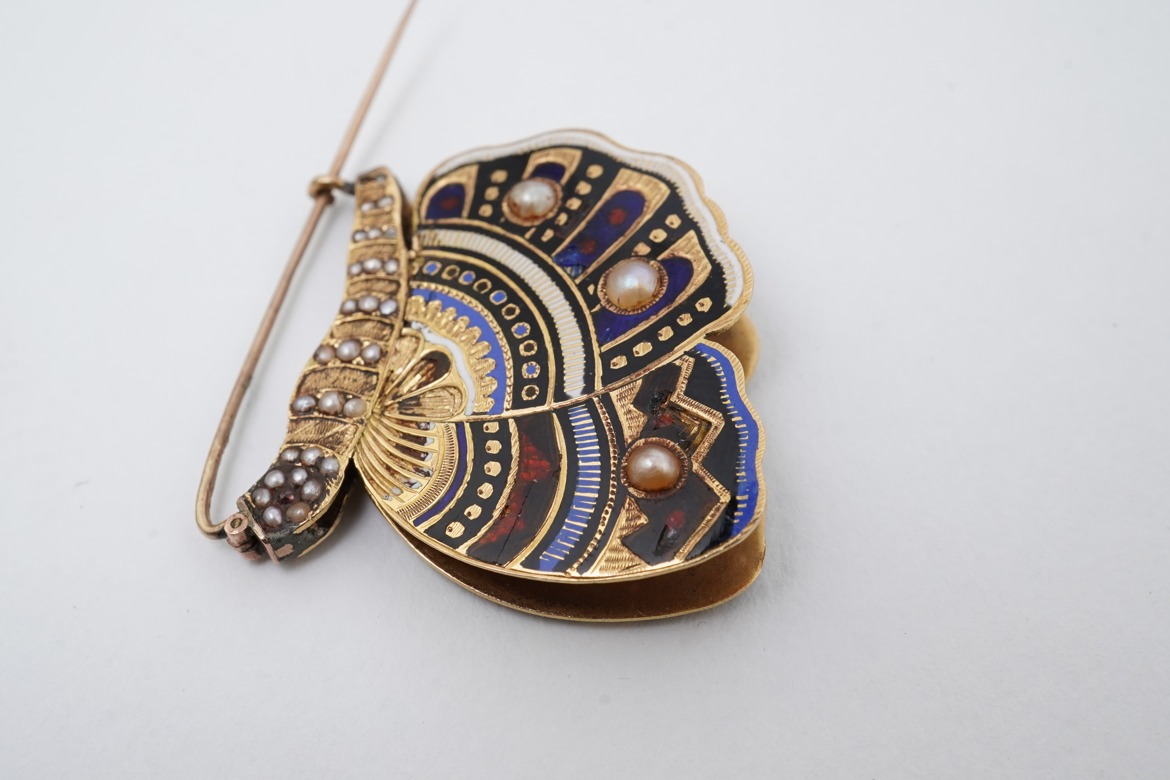 An enamel and seed pearl brooch, circa 1840